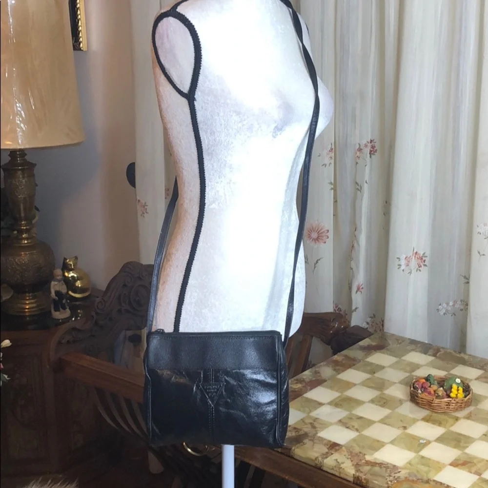 Black faux leather crossbody handbag